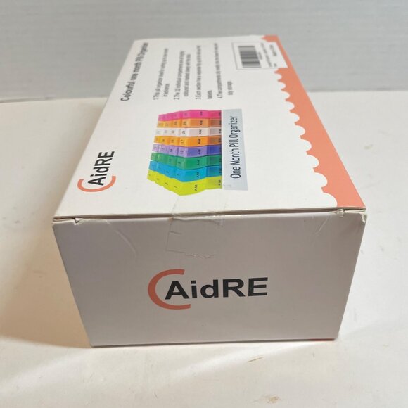 Colourful One Month Pill Organizer With 32 Compartments For AM & PM Use By AidRE - Picture 5 of 7